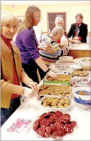  ?? PHOTO SUBMITTED ?? Members of the Noel Woman’s Club bag cookies for the Meals on Wheels program.