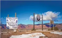  ?? ROBERTO E. ROSALES/JOURNAL ?? A sign outside of Chinle, Ariz., on the Navajo Nation reminds residents of COVID-19 prevention measures.