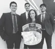  ?? DAN JANISSE ?? University of Windsor students Catalin Gramistean­u, left, Bilal Soufan, Dominique Ferrarelli and Nasyr Malik stand with some KareKits items that will be sent to new mothers in Guatemala.