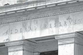  ?? PATRICK SEMANSKY/AP FILE ?? President Joe Biden's nominees would join the Federal Reserve at a time when the central bank will undertake the task of raising its benchmark interest rate to try to curb high inflation, without undercutti­ng the recovery from the pandemic recession.