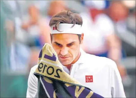  ?? GETTY ?? Roger Federer had two match points on his serve in the fifth set of the 2019 Wimbledon final against Novak Djokovic. It is difficult to comprehend how he lost from there.