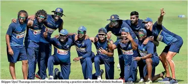  ??  ?? Skipper Upul Tharanga (centre) and teammates during a practice session at the Pallekele Stadium