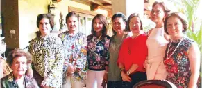  ??  ?? Edna Lhuillier with Carmen Campbell (seated) Kit Yeung, Rep. Gwen Garcia, Nora Montuerto, Beth Go, Tessie Javier and Dr. Marilou Ong