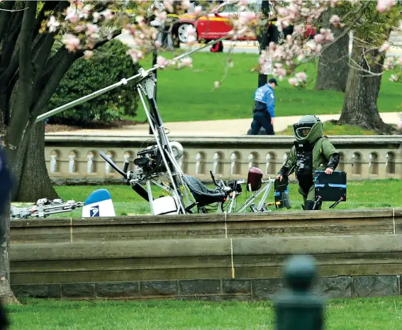  ??  ?? WINGED NUT: D.C. has air defenses that would have made Saddam Hussein jealous, yet an unhinged postal worker piloted a gyrocopter through the city’s no-fly zone, circled the Washington Monument and landed on the Capitol’s West Lawn last year.