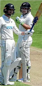  ?? PHOTOSPORT ?? Devon Conway scored a half-century in an inter-squad game this week while skipper Kane Williamson had a stint at the bowling crease, left.