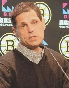  ?? STAFF PHOTO BY ARTHUR POLLOCK ?? FIRING LINE: Bruins GM Don Sweeney explains his decision to fire coach Claude Julien yesterday.