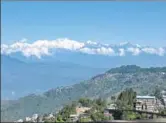  ??  ?? A view of the Himalayas from the Oberoi Hotel. Though there are around 350 hotels and home stays in Darjeeling, they have to cope with disruption­s and water scarcity