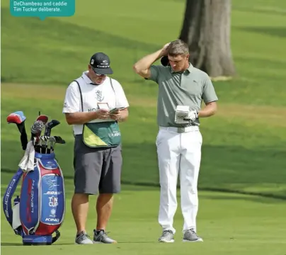  ??  ?? DeChambeau and caddie Tim Tucker deliberate.