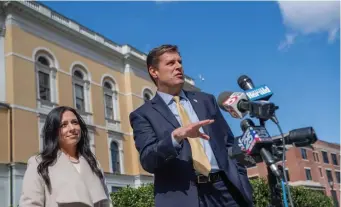  ?? BosTon HeRALd FILe ?? PRESENT: Candidate for governor and former state Rep. Geoff Diehl announces his running mate, Leah Allen Cole, in March.