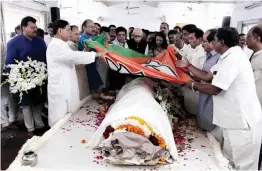  ?? — ASIAN AGE ?? Senior BJP leader L. K. Advani pays tribute to former Delhi chief minister Madan Lal Khurana at the Delhi BJP office on Sunday.