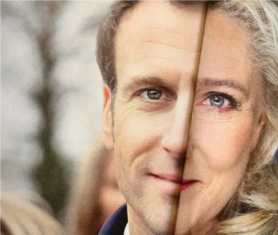  ?? FOTO: NICOLAS TUCAT / AFP ?? To rivaler, en vinder. Billedet er taget af to foldede valgbrochu­rer for Emmanuel Macron (tv) og Marine Le Pen. Resultatet ventes kl. 20 søndag aften.