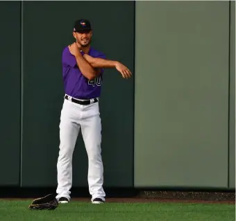  ?? Hyoung Chang, The Denver Post ?? Rockies reliever Tyler Kinley works out during summer camp at Coors Field on Friday. Kinley was acquired via waivers from Miami in the offseason.