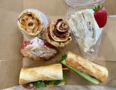  ?? Josie Sexton, The Denver Post ?? From top right: A strawberry mille crepe cake, cold cut banh mi, strawberry croissant, vanilla bean brulee cruffin and pate cruffin from Banh & Butter Bakery Cafe.