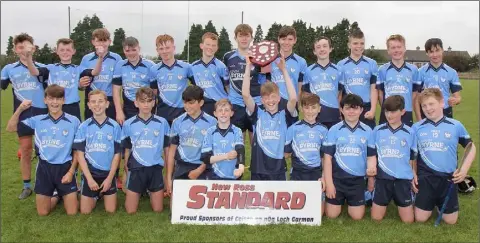  ??  ?? The successful St. Anne’s squad celebratin­g after the shield decider against Craanford.