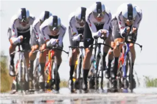  ?? Christophe Ena / Associated Press ?? Team Sky riders, featuring Britain’s Chris Froome, ride during the third stage, a 22-mile time trial. The team lost to BMC as Belgian rider Greg Van Avermaet took the overall lead.