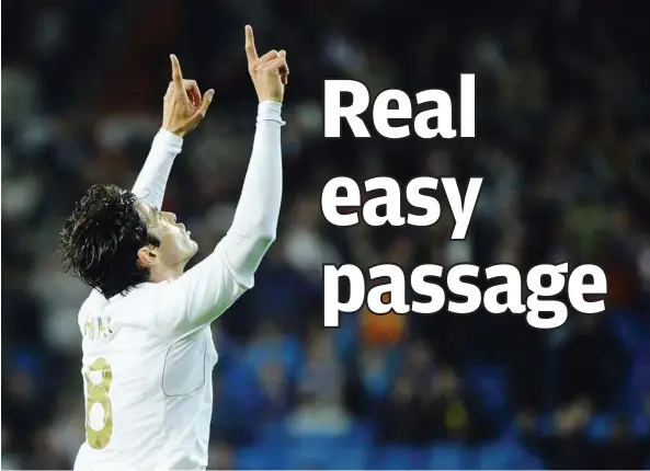  ??  ?? Heaven-sent: Real Madrid’s Kaka celebrates after scoring against APOEL Nicosia during their Champions League quarter-final second leg match at the Bernabeu on Wednesday. — AFP