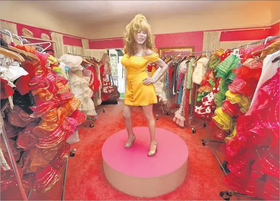  ?? Genaro Molina Los Angeles Times ?? CHARO makes the most of a pedestal in her costume room. The onetime Johnny Carson regular says she’s learned: “The American audience loves something original.”