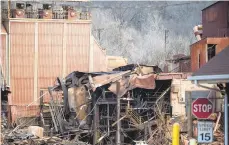  ?? PHOTOS BY RICKKINTZE­L/THE MORNING CALL ?? Demolition work continues at the old Pfizer plant Tuesday in Wilson. For decades, the property was known as Pfizer Corp. and later Harcross Pigments. It was most recently home to Venator Materials, a corporate spin offofTexas giant Huntsman Corp.