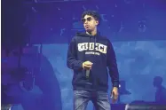  ?? AMY HARRIS/INVISION ?? 21 Savage performs last year at the Voodoo Music Experience in City Park in New Orleans. The rapper is to be released on bond..