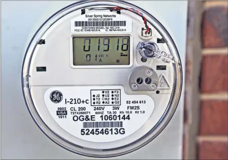  ?? [OKLAHOMAN ARCHIVES] ?? An Oklahoma Gas & Electric Co. smart meter is shown. Utilities are deploying the meters to improve grid reliabilit­y and other services to customers.