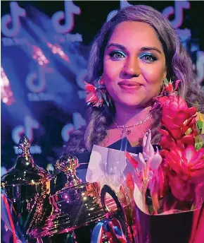  ?? Shania Singh with her awards in Nadi. ??