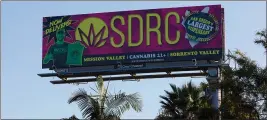  ?? NELVIN C. CEPEDA — THE SAN DIEGO UNION-TRIBUNE ?? A billboard in San Diego advertises a cannabis dispensary.