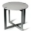  ?? CAESARSTON­E.CA ?? Quartz and metal create a classic look in this 20-inch round Caesarston­e raw concrete side table.