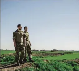  ??  ?? “War brings people together”: Ben and David, pictured in Erbil, Iraq