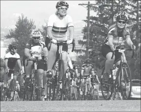  ?? AMANDA SHORT/Special to The Herald ?? Riders started their day with a tough climb up Vancouver Hill.