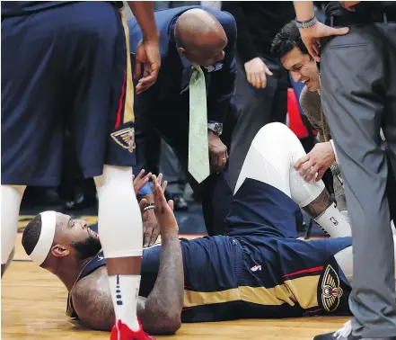  ?? — THE ASSOCIATED PRESS ?? Pelicans centre DeMarcus Cousins will miss the rest of the season with a ruptured Achilles tendon just as sixth-place New Orleans was surging up the Western Conference standings.