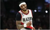  ?? STEPH CHAMBERS — GETTY IMAGES ?? Portland's Gary Payton II reacts after his basket against the San Antonio Spurs during a game on Jan. 23. A failed physical is putting his return to the Warriors in jeopardy.