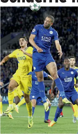  ?? — AFP ?? Leicester City’s Islam Slimani ( centre) heads the ball in their Champions League Group G match against Porto in Leicester on Wednesday.