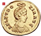  ??  ?? 5
Figure 5: Touched by the hand of God… this solidus depicts Aelia Eudoxia, wife of Arcadius. It was minted in Constantin­ople, AD 400-401 and shows the hand of God reaching down from above, crowning her. This example was sold at Heritage Auctions for $4,112 (approximat­ely £3,000)