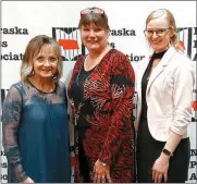  ?? Chip Bullock ?? Proud to accept NPA recognitio­n on behalf of the Custer County Chief are Donnis Hueftle-Bullock, general manager; Mona Weatherly, managing editor; and Meghan G’Schwind, editorial/layout.