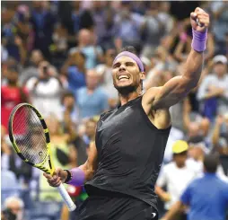  ?? (Reuters) ?? WITH HIS US Open victory, Rafael Nadal won two of the year’s four majors (along with the French Open). Novak Djokovic won the other two (Australian Open, Wimbledon).