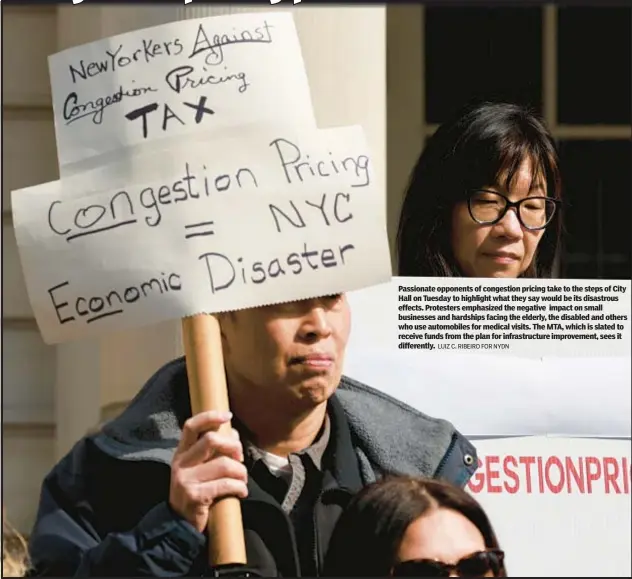  ?? LUIZ C. RIBEIRO FOR NYDN ?? Passionate opponents of congestion pricing take to the steps of City Hall on Tuesday to highlight what they say would be its disastrous effects. Protesters emphasized the negative impact on small businesses and hardships facing the elderly, the disabled and others who use automobile­s for medical visits. The MTA, which is slated to receive funds from the plan for infrastruc­ture improvemen­t, sees it differentl­y.