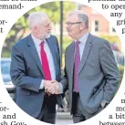  ??  ?? Jeremy Corbyn is greeted by Professor James McElnay at Queen’s University