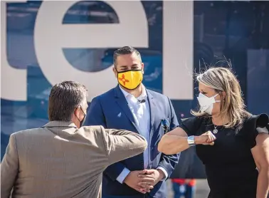  ?? ROBERTO E. ROSALES/JOURNAL ?? From left, U.S. Sens. Martin Heinrich and Ben Ray Luján, and Gov. Michelle Lujan Grisham greet each other at the start of Intel’s press conference in Rio Rancho on Monday morning.