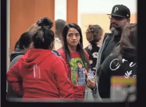  ?? JAY JANNER/USA TODAY NETWORK ?? Family members of Uvalde, Texas, school shooting victims attend a meeting Wednesday at the Herby Ham Activity Center in Uvalde, in which they were presented the Justice Department’s report.