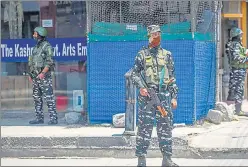  ?? PTI ?? Security personnel stand guard, in Srinagar, on Wednesday.