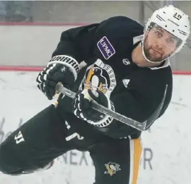  ?? Peter Diana/Post-Gazette ?? Newly acquired left wing Jason Zucker goes through drills at practice Thursday in Cranberry. The Penguins gave up a lot to get him from Minnesota but believe he can help them win now. Plus, he’s under contract through 2022-23 at an affordable $5.5 million a year.