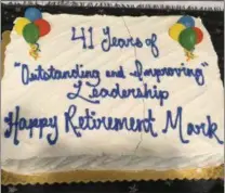  ?? MICHAEL P. RELLAHAN — DIGITAL FIRST MEDIA ?? A cake marking the retirement of Mark Rupsis.