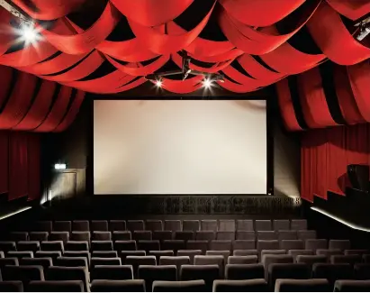  ??  ?? LEFT: The three screening rooms are draped in red fire-rated velveteen to improve acoustics. The plush seating is from Quinette Gallay, in France.