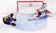  ?? (Reuters) ?? FLORIDA PANTHERS goalie James Reimer makes a toe-save as St. Louis Blues forward Jori Lehtera looks for the rebound during the second period of the Panthers’ 2-1 road victory on Monday night.