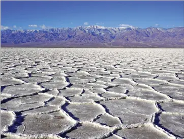  ?? Photo courtesy of the National Park Service ?? The body of Douglas Branham was found in the Badwater Road and Panamint Mountains. salt flats area pictured here, looking west towards West Side
