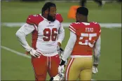  ?? SCOT TUCKER — THE ASSOCIATED PRESS, FILE ?? The 49ers’ Dee Ford (55) and the Cardinals’ Angelo Blackson (96) talk after Sunday’s game in Santa Clara.