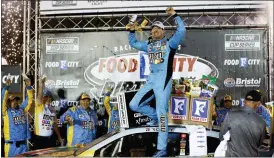  ?? WADE PAYNE — THE ASSOCIATED PRESS ?? Driver Kyle Busch celebrates after winning a NASCAR Cup Series auto race, Sunday, in Bristol, Tenn.