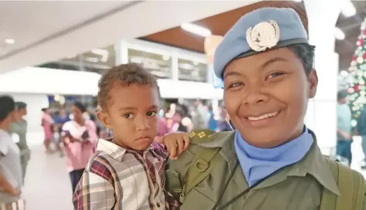  ?? Mereleki Nai ?? Captain Loraini Rokosuka with son Samisoni Navunicagi at the Nadi Internatio­nal Airport. Photo: