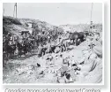  ??  ?? Canadian troops advancing toward Cambrai. Photo: Library and Archives Canada