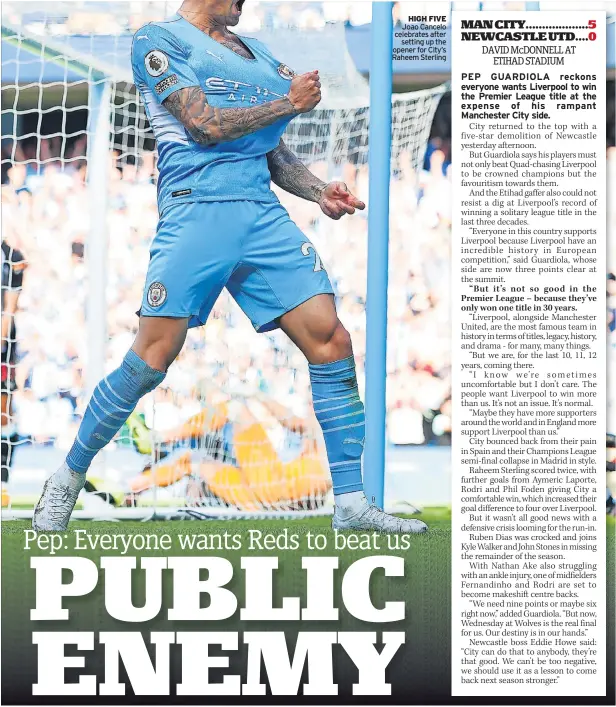  ?? ?? HIGH FIVE Joao Cancelo celebrates after setting up the opener for City’s Raheem Sterling